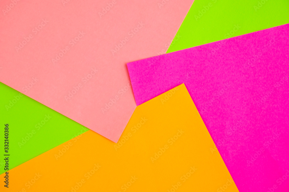 Multicolored paper background close-up.