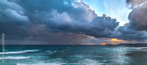 Dark clouds over Capo Caccia at sunset © Gabriele Maltinti