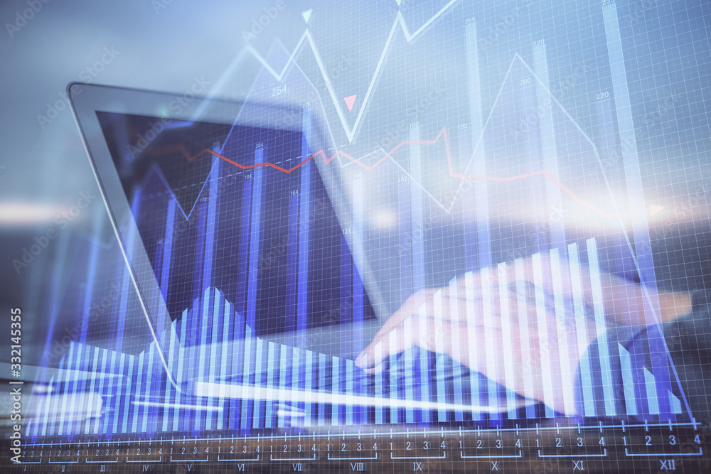Double exposure of stock market graph with man working on laptop on background. Concept of financial analysis. Double exposure of stock market graph with man working on laptop on background. Concept of financial analysis.