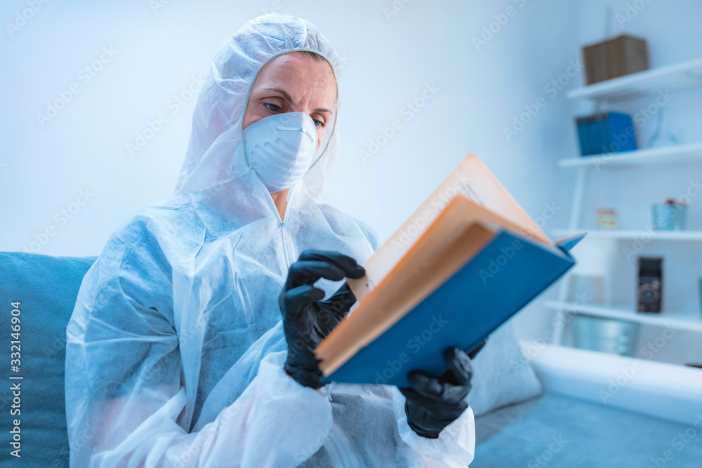 Self-isolation and sitting at home, doing hobbies, reading book, prevention, hysteria, fear of viruses and diseases. Self-isolation and sitting at home, doing hobbies, reading book, prevention, hysteria, fear of viruses and diseases.