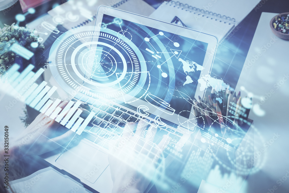 Double exposure of businessman working on laptop on background. International business hologram in front. Concept of success. Double exposure of businessman working on laptop on background. International business hologram in front. Concept of success.