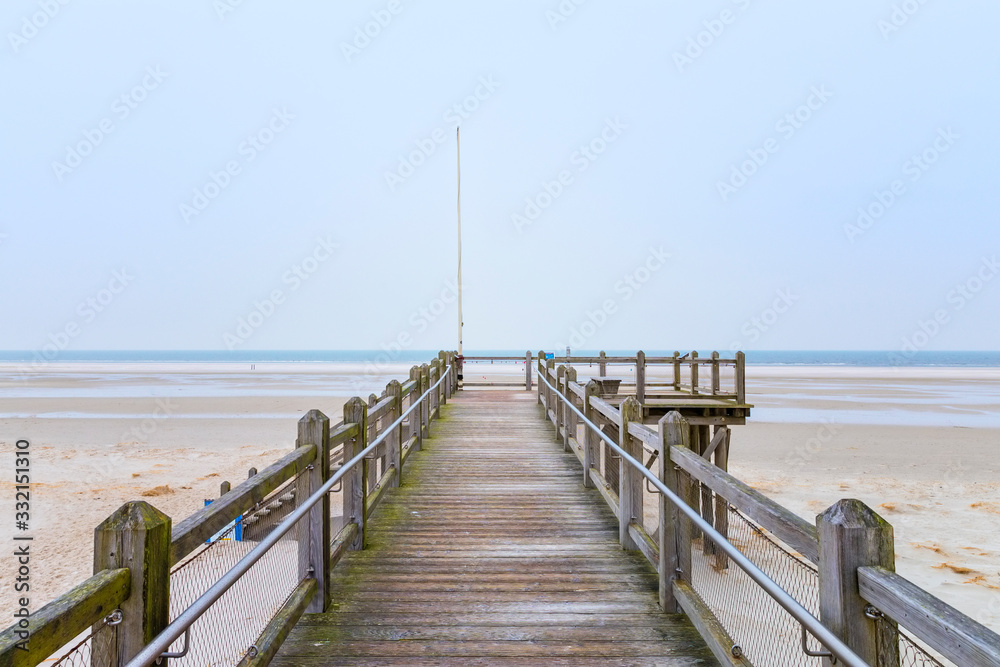 Wooden lookout facing the sea at the beach of Norddorf on the German North Sea island of Amrum