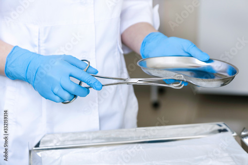 surgery covid coronavirus 19 swab equipment operation hand blue gloves tweezers tampon