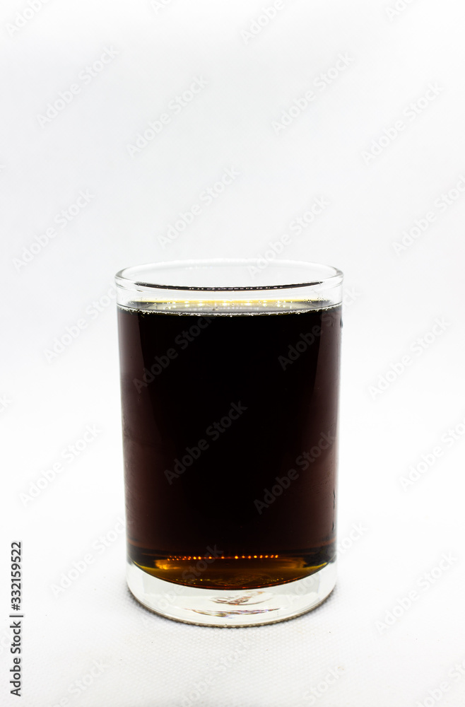 Cola drink in glass isolated on white background, copy space template. Cola drink in glass isolated on white background, copy space template.