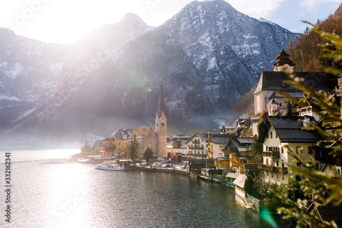 The most beautiful village of Hallstatt in winter in the Austrian Alps in backlight
