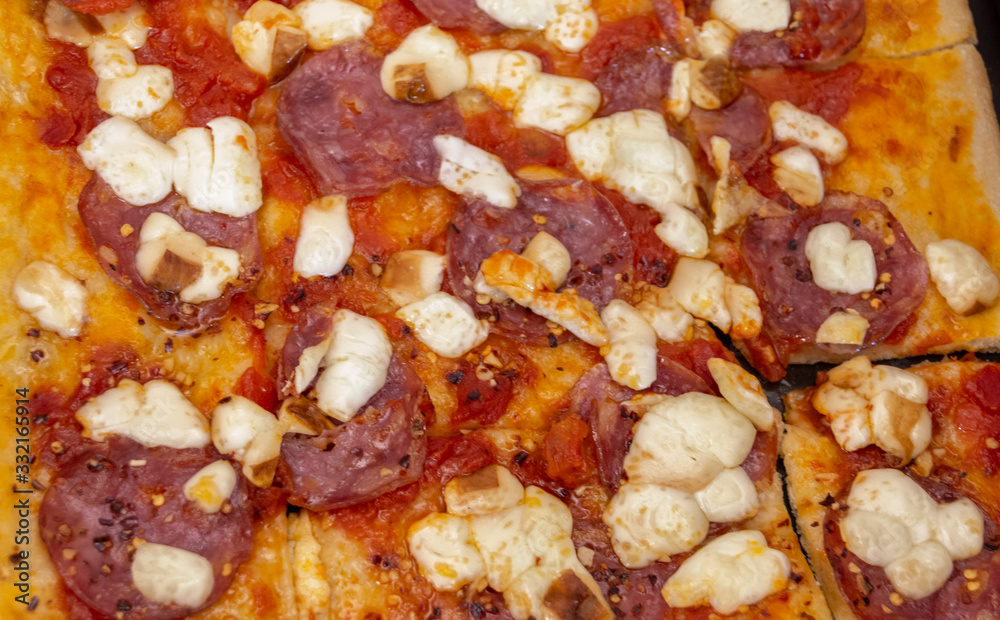 Pizza with tomato, salami and provola Pizza with tomato, salami and provola
