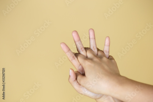 Female hands washing hands with gel to kill covid virus 19