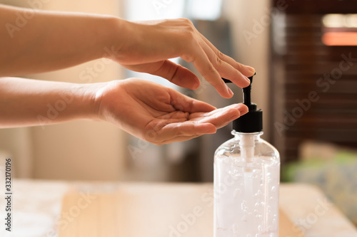 Asian people using alcohol,using alcohol gel clean wash hand sanitizer anti virus bacteria.