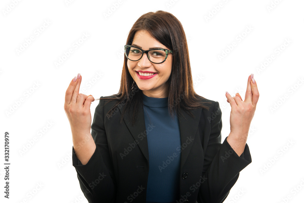Portrait of business girl wearing glasses showing double fingers crossed Portrait of business girl wearing glasses showing double fingers crossed