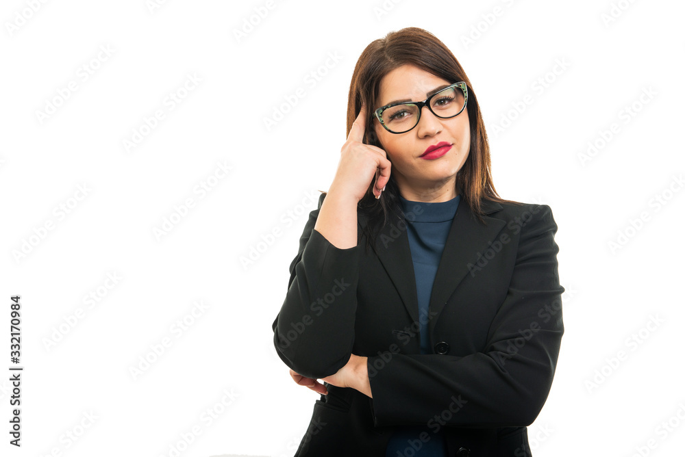 Portrait of young business girl wearing glasses making thinking gesture