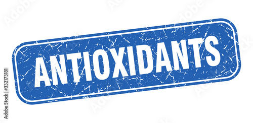 antioxidants stamp. antioxidants square grungy blue sign.