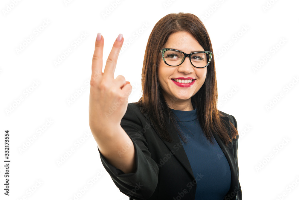 Portrait of young business girl wearing glasses showing number two Portrait of young business girl wearing glasses showing number two