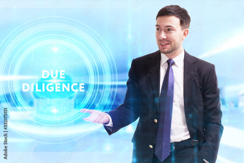 Business, Technology, Internet and network concept. Young businessman working on a virtual screen of the future and sees the inscription: Business, Technology, Internet and network concept. Young businessman working on a virtual screen of the future and sees the inscription: