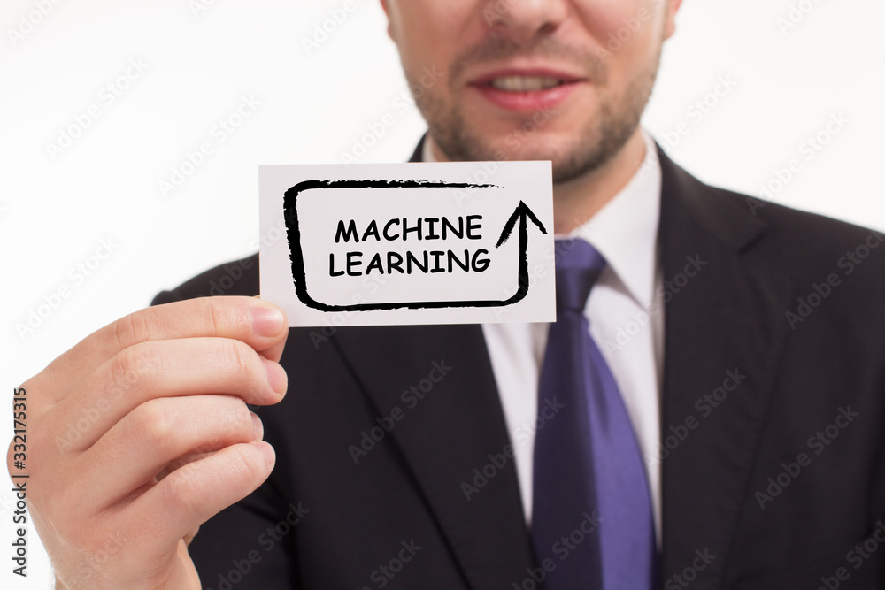 Business, Technology, Internet and network concept. Young businessman working on a virtual screen of the future and sees the inscription: Business, Technology, Internet and network concept. Young businessman working on a virtual screen of the future and sees the inscription: