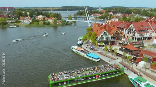 A Beautiful Wide River with Boat At Shoreline at Poland- Aerial Shot photo