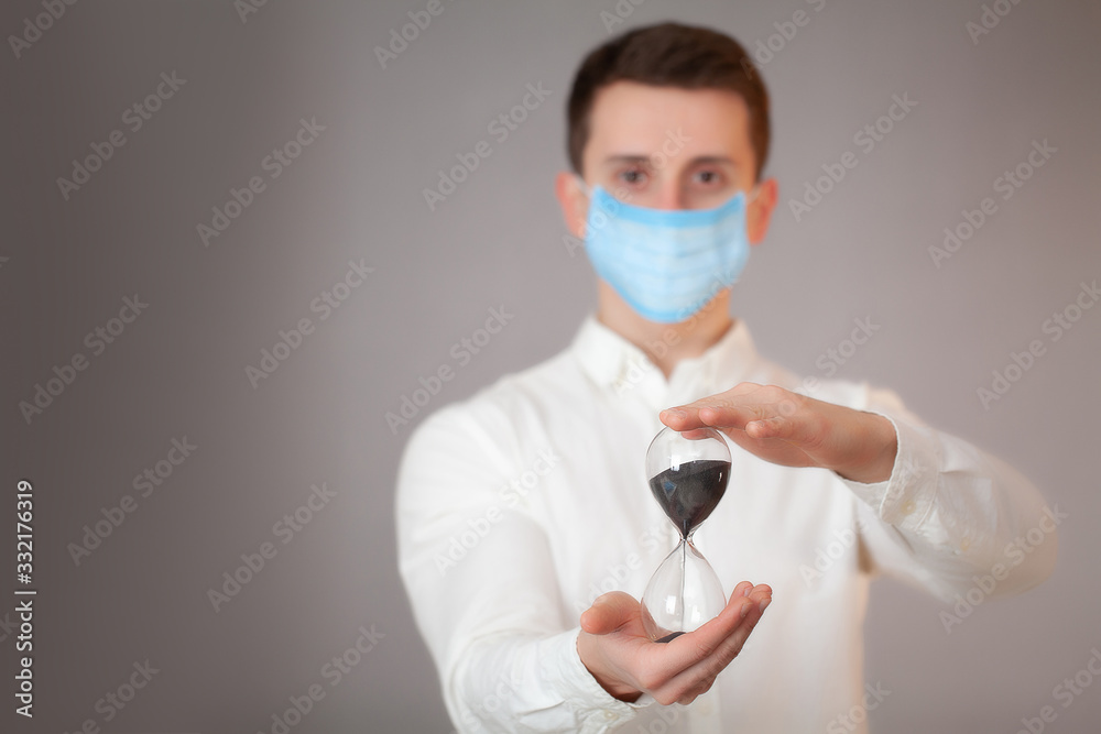 Man working in the office wearing a mask for protection from coronavirus. Man working in the office wearing a mask for protection from coronavirus.