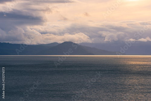 Scenic high rocks in the Pacific Ocean. Kamchatka Peninsula.