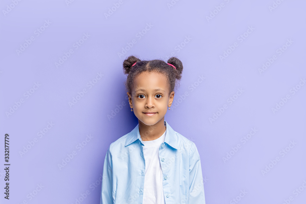 portrait of cute or african kid girl isolated over purple background. beautiful shy little girl posing at camera, smile portrait of cute or african kid girl isolated over purple background. beautiful shy little girl posing at camera, smile