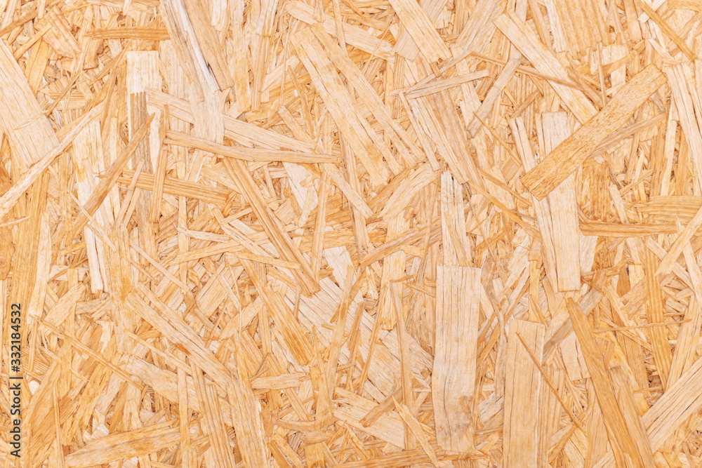 Oriented strand board or osb for a natural recycled wood background. Oriented strand board or osb for a natural recycled wood background.