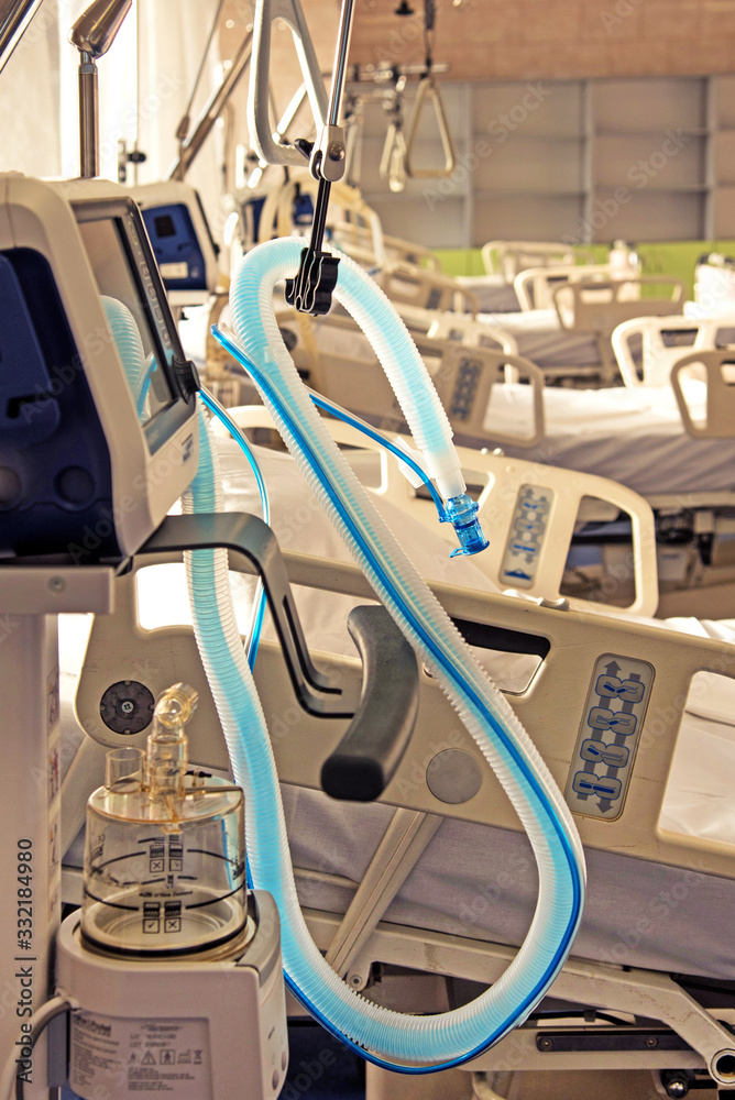 Plastic tube of artificial ventilation apparatus in a modern hospital in the intensive care room. (coronavirus, death, sorrow, hope, salvation - concept)