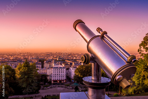 Telescope, view from Montmartre Hill at sunrise, Paris, France