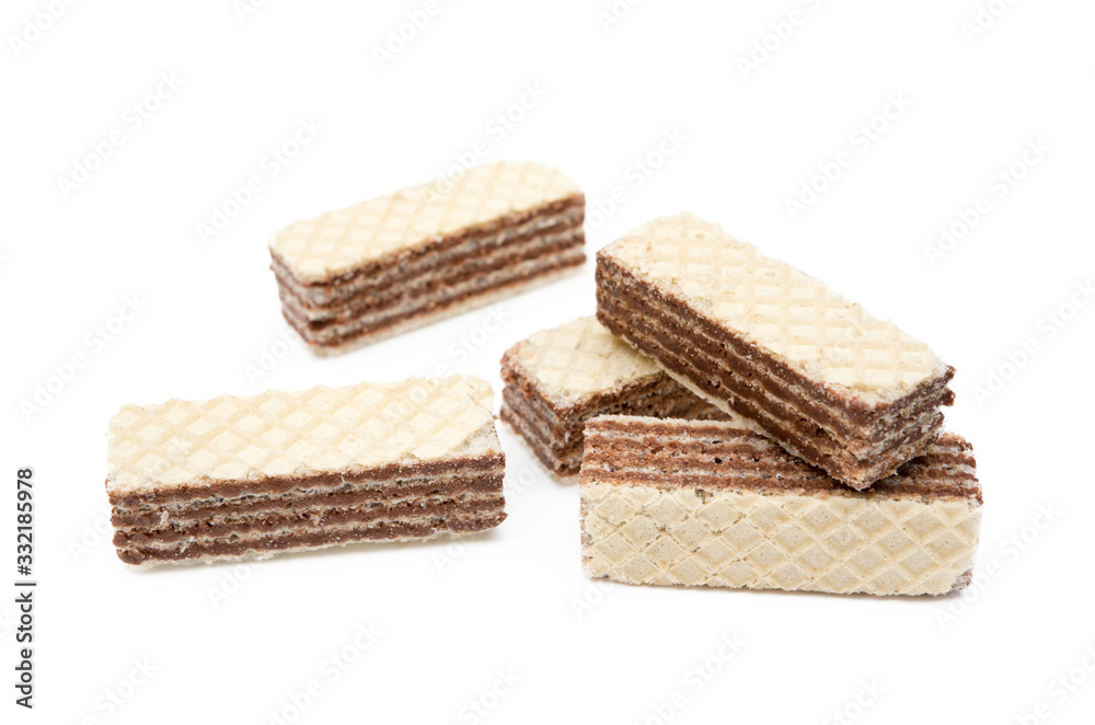 Crispy wafers with creamy hazelnut filling isolated on white background Crispy wafers with creamy hazelnut filling isolated on white background