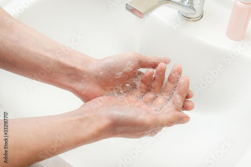 Washing hands with soap and water. Antibacterial protection and self-care. Stop the spread of infection.