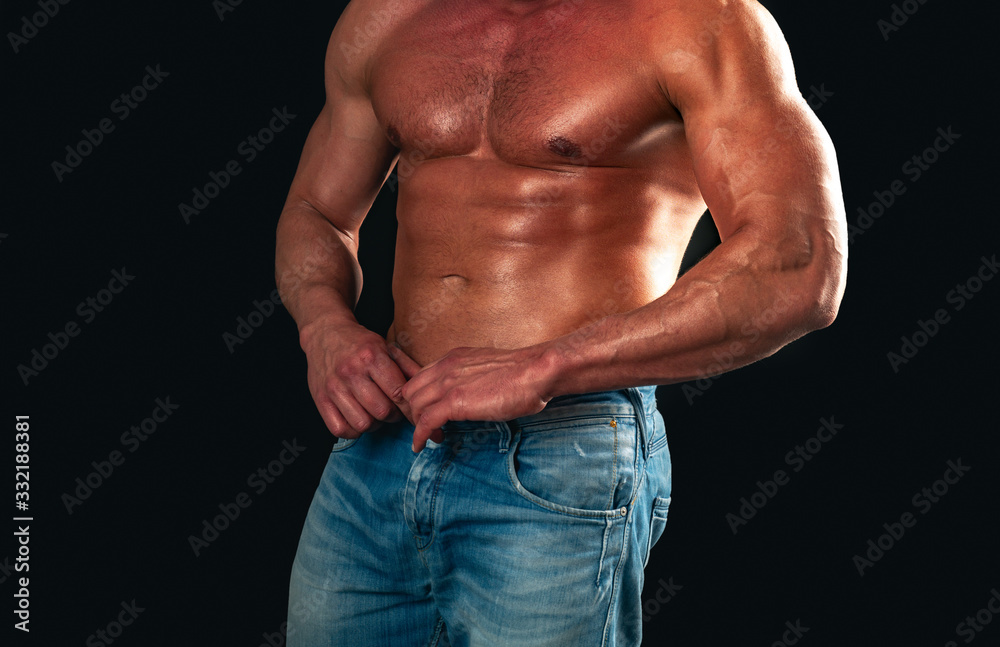 Athletic man with ab, abs or six pack. Chest muscles. Male torso.