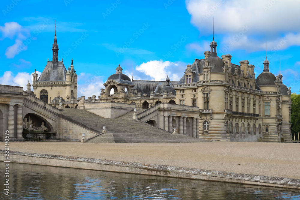 External view of famous Chantilly Castle, 1560 - a historic castle located in town of Chantilly, Oise, Picardie .