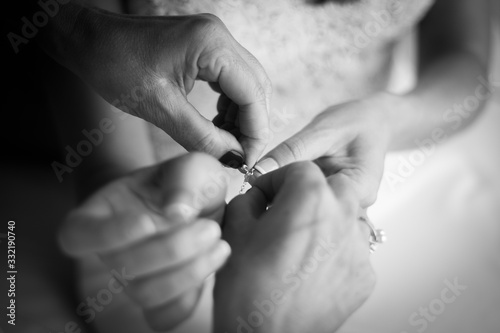 Bracalet, mother dressing her daughter for her wedding
