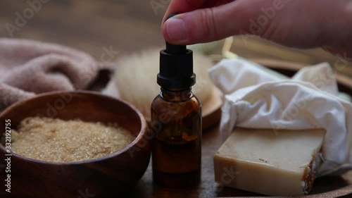 Spa setting with massage oil bottle 