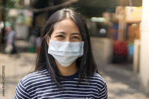 Asian woman wear protective face mask., with copy space
