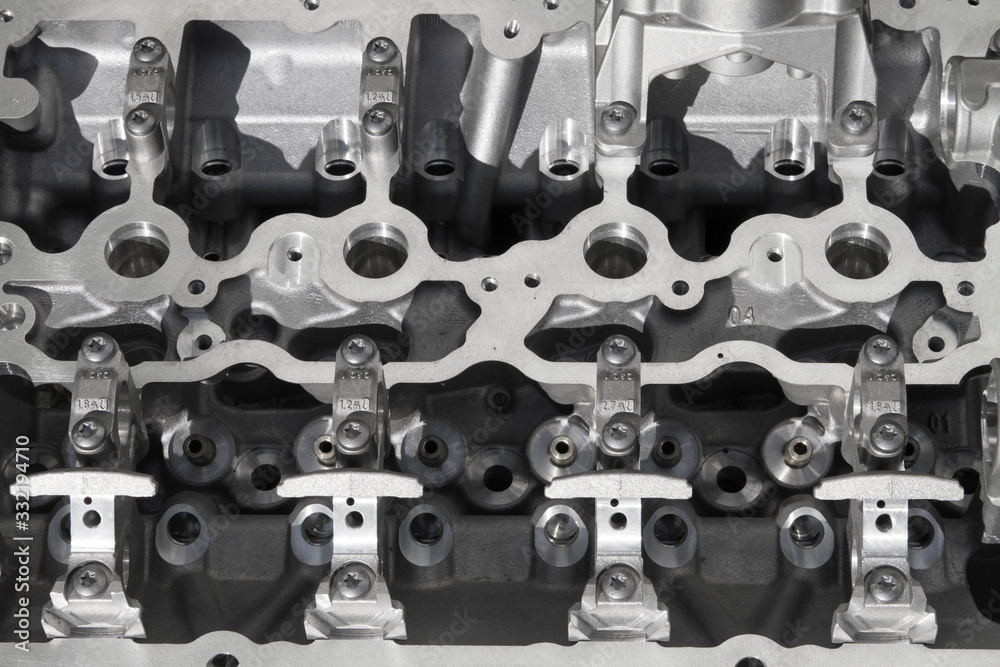 Fototapeta premium New spare part - cylinder head of a motor