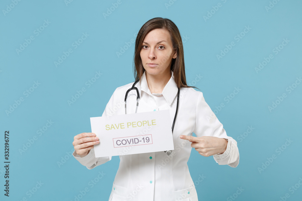 Doctor woman female in white medical suit gown hold nameplate save people isolated on blue background studio. Epidemic pandemic new rapidly spreading coronavirus 2019-ncov medicine flu virus concept. Doctor woman female in white medical suit gown hold nameplate save people isolated on blue background studio. Epidemic pandemic new rapidly spreading coronavirus 2019-ncov medicine flu virus concept.