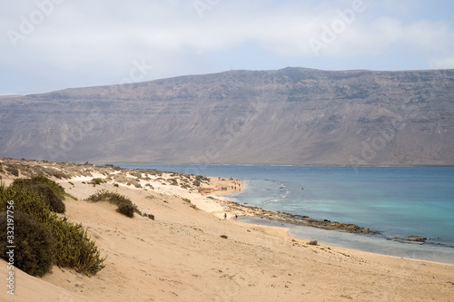 Paradise beach at La Graciosa Island with view on Lanzarote in the background, Canary Islands, Spain © LourdesConvertida