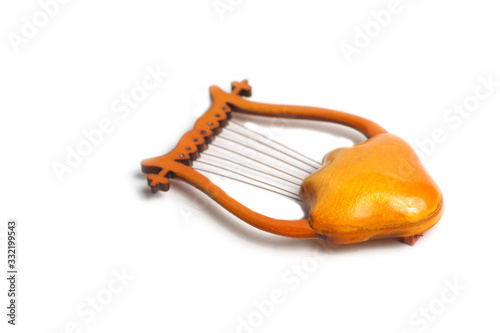 lyre isolated against light background flat lay photo