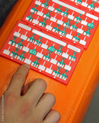 Photography bingo scorecards and the hand of boy