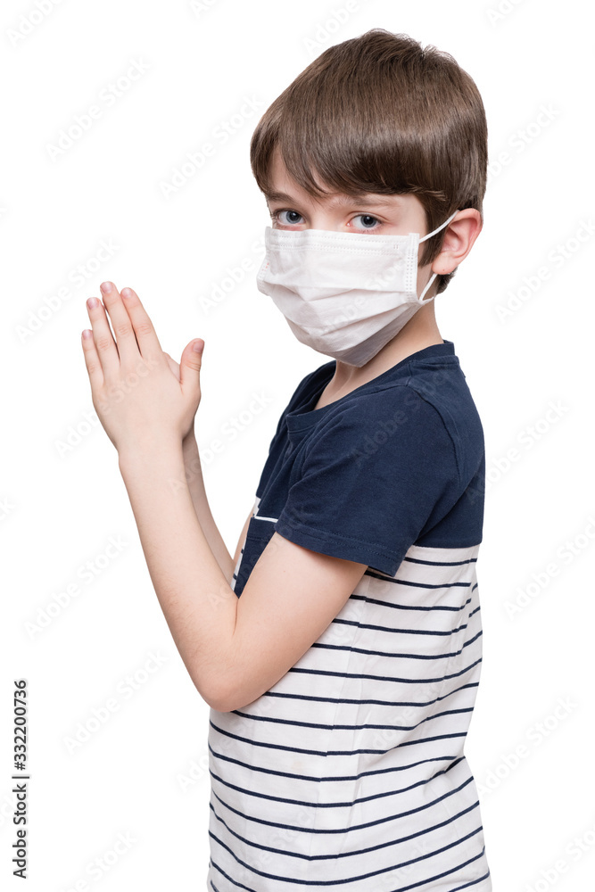 Little boy with face mask praying, isolated on white background Little boy with face mask praying, isolated on white background