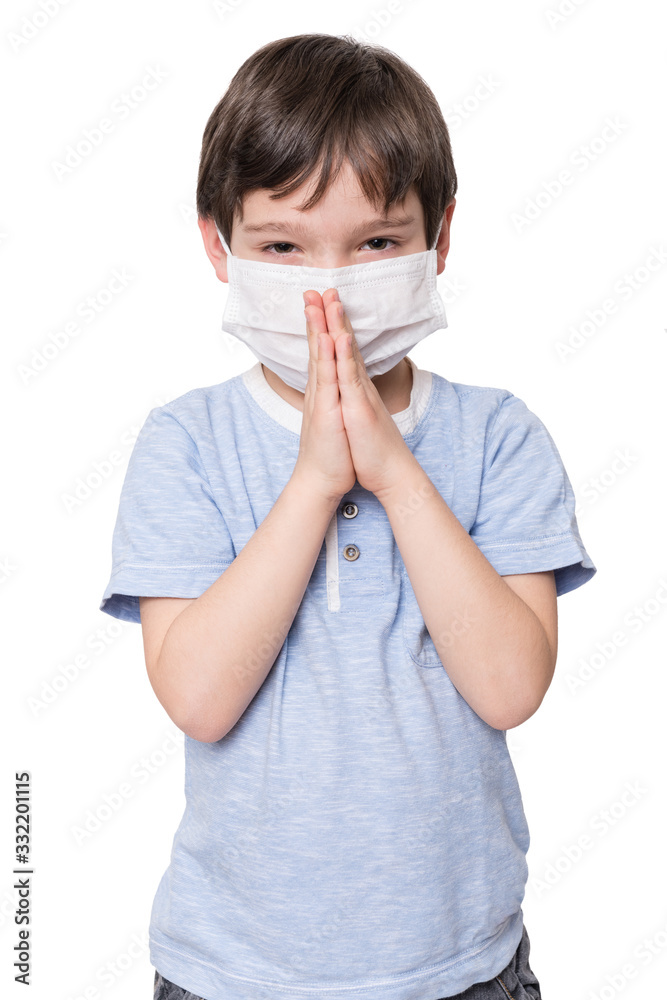 Little boy with face mask praying, isolated on white background Little boy with face mask praying, isolated on white background
