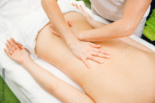 Professional back massage beauty spa girl, top view