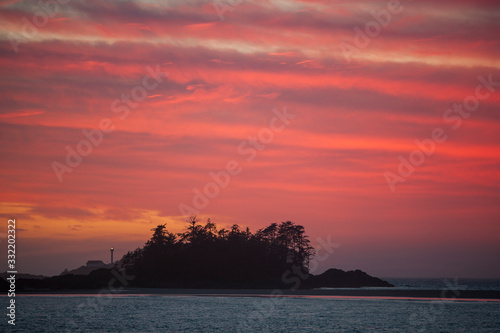 red sky over small island