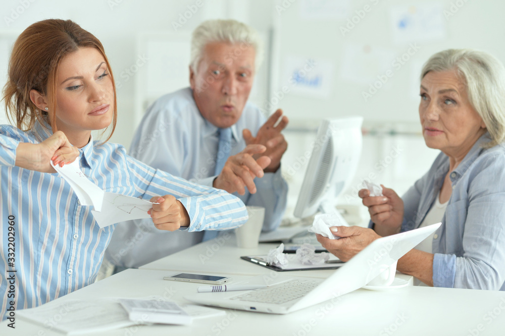 Portrait of group of successful business people in modern office Portrait of group of successful business people in modern office