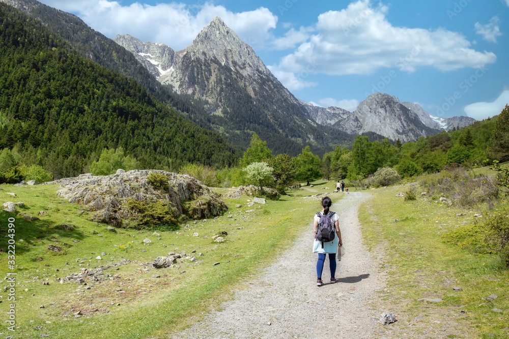 Beautiful Pyrenees mountain landscape from Spain, Catalonia. Tourist walking on the road