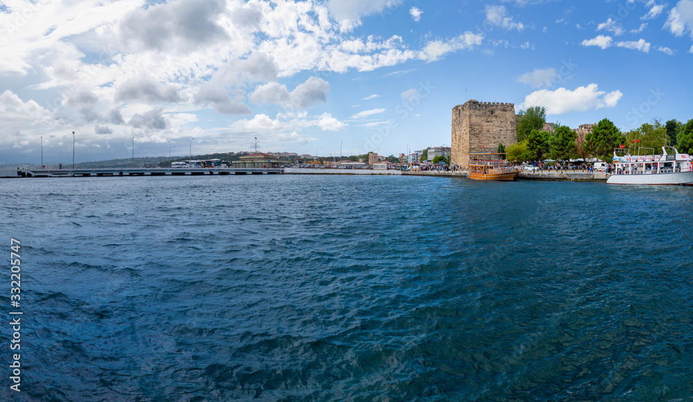 Sinop/Turkey - August 04 2019: View of a boats and Sinop castle in background with blacksea.