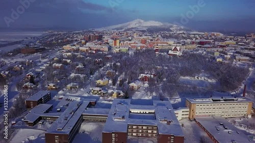 Aerial winter sunny view of Kiruna, the northernmost town in Sweden, province of Lapland, Norrbotten County, footage shot from drone photo