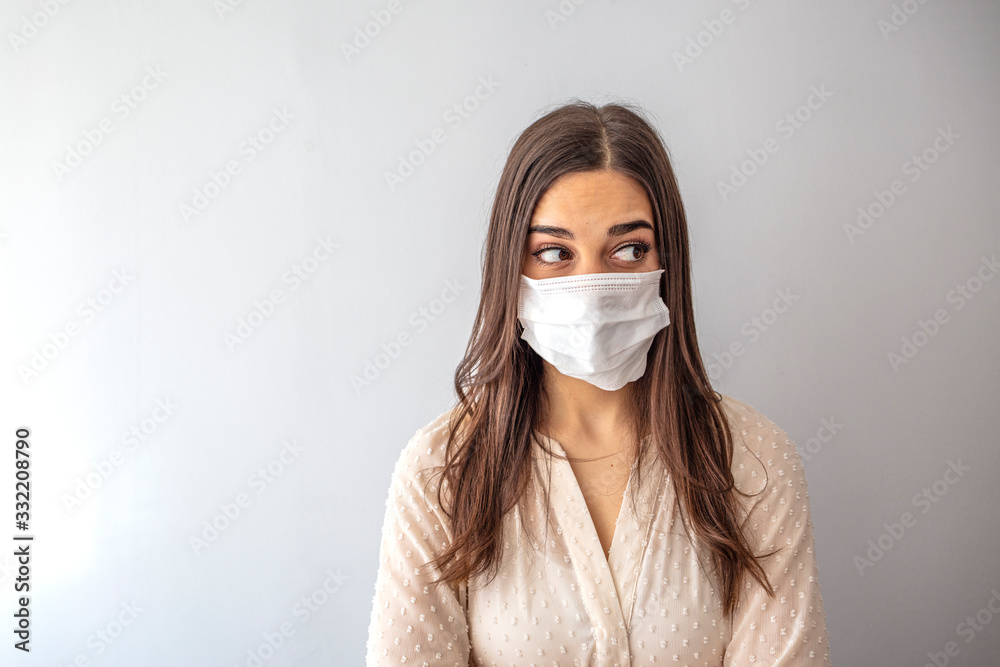 Girl with mask to protect her from Corona virus. Corona virus pandemic. Girl with medical mask to protect her from virus. People hospitalized, diagnosed, in carantine (isolation) Girl with mask to protect her from Corona virus. Corona virus pandemic. Girl with medical mask to protect her from virus. People hospitalized, diagnosed, in carantine (isolation)