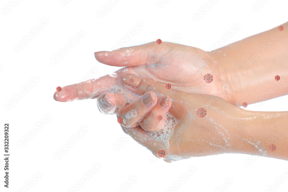 Close up of washing hands with soap with red corona virus isolated on white background. Coronavirus prevention hand hygiene. Corona Virus pandemic protection by cleaning hands frequently.