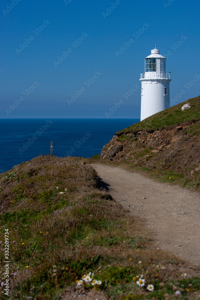 lighthouse facing the ocean