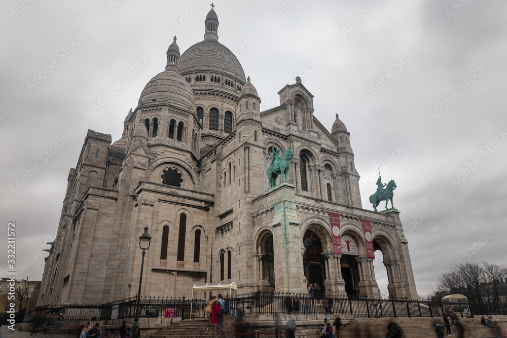 Basilica of Sacré-Coeur de Paris at the iconic neighborhood of Montmartre; Paris, France.