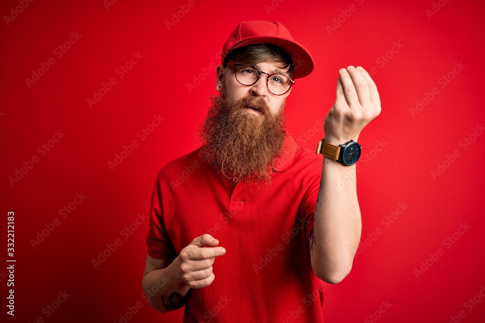 Young handsome delivery man wearing glasses and red cap over isolated background Doing Italian gesture with hand and fingers confident expression Young handsome delivery man wearing glasses and red cap over isolated background Doing Italian gesture with hand and fingers confident expression